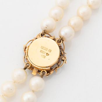 Cultured salt water pearl necklace, Claps 18K gold with enamel and old cut diamonds.