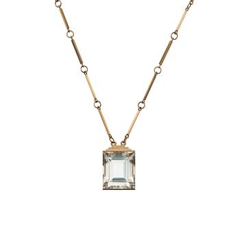 662. A Wiwen Nilsson 18k gold and rock crystal pendant and chain, Lund 1943.