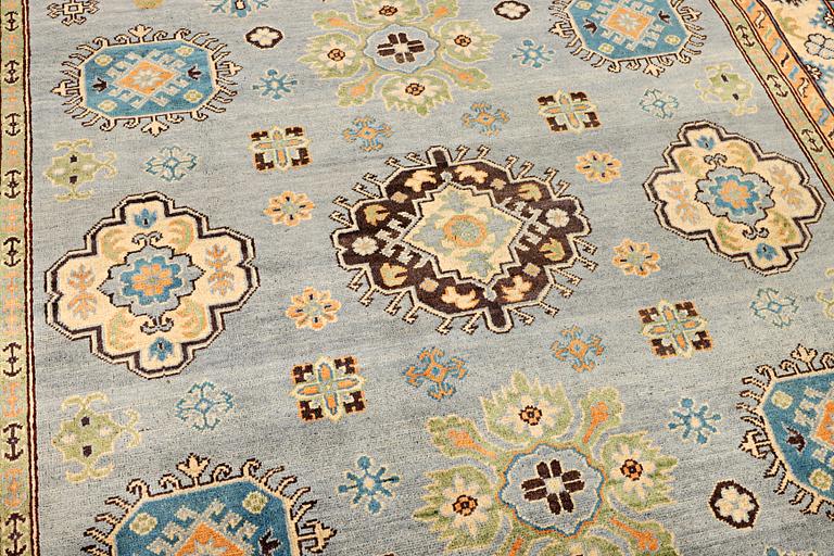 A Kazak carpet, c. 295 x 206 cm.