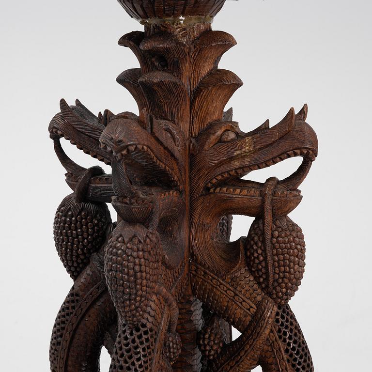 A South East Asian carved wooden piedestal,  20th Century.
