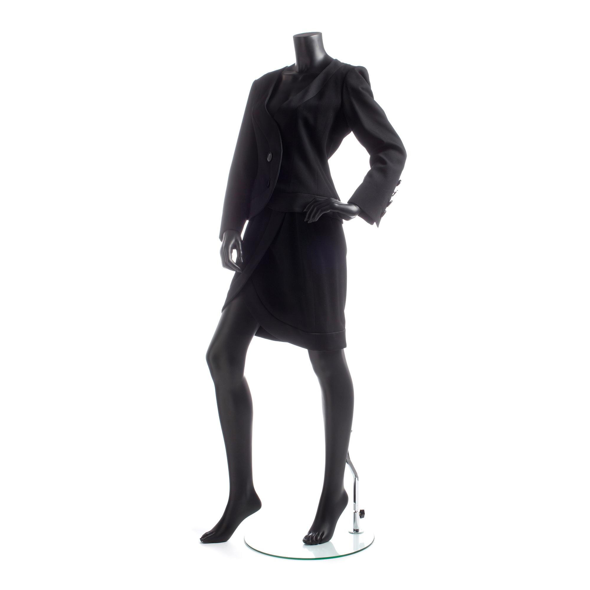 YVES SAINT LAURENT, a black wool dress.