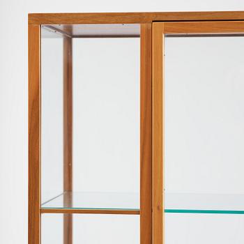 Josef Frank, a walnut showcase cabinet model "B 2077", Firma Svenskt Tenn.