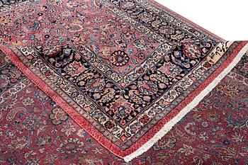 An antique Saber carpet, signed, a. 405 x 295 cm.
