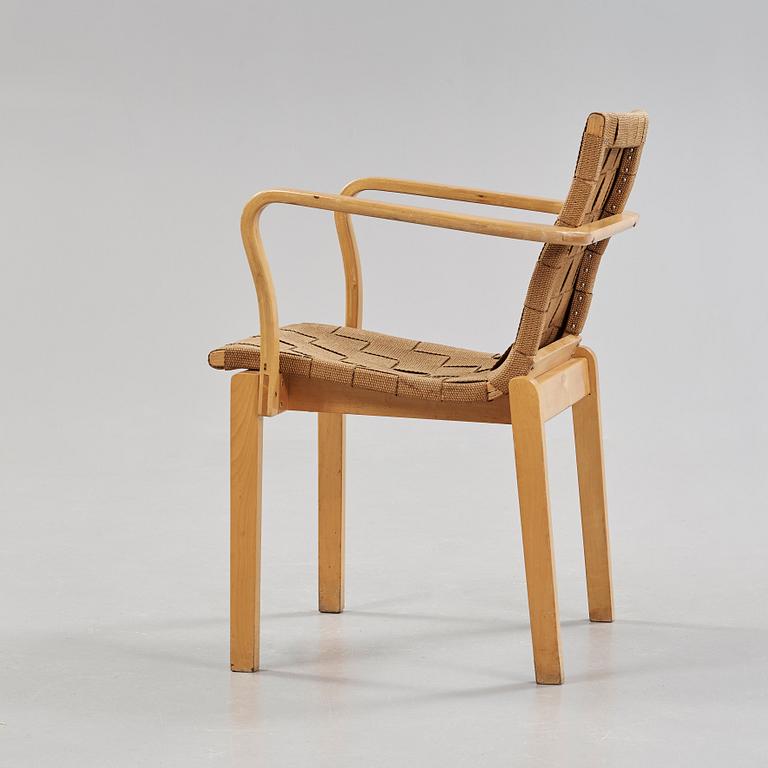 An Alvar Aalto armchair, made on license by Aalto Design, Hedemora for Artek, Sweden 1946-56.
