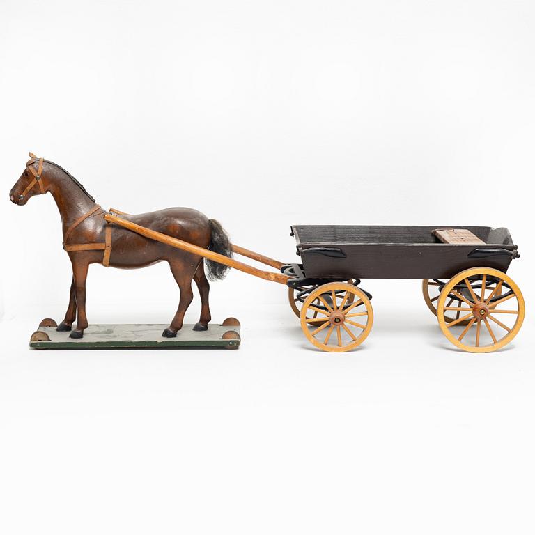 Horse-drawn carriage, early 20th century.