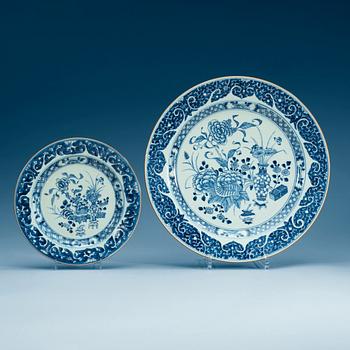 1728. Four different sized blue and white dishes, Qing dynasty, Qianlong (1736-95).