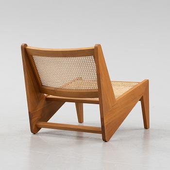 Pierre Jeanneret, a teak and rattan '058 Kangaroo' easy chair, Cassina, Italy.