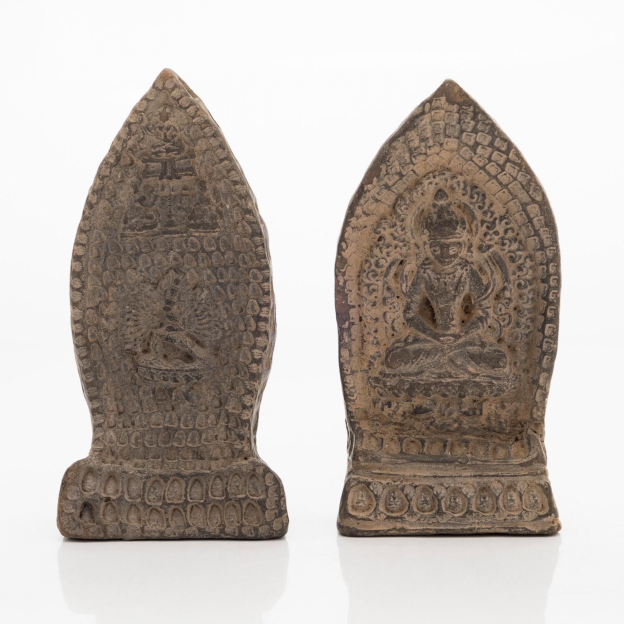 Two steles/tsa tsas, presumably circa 1900.