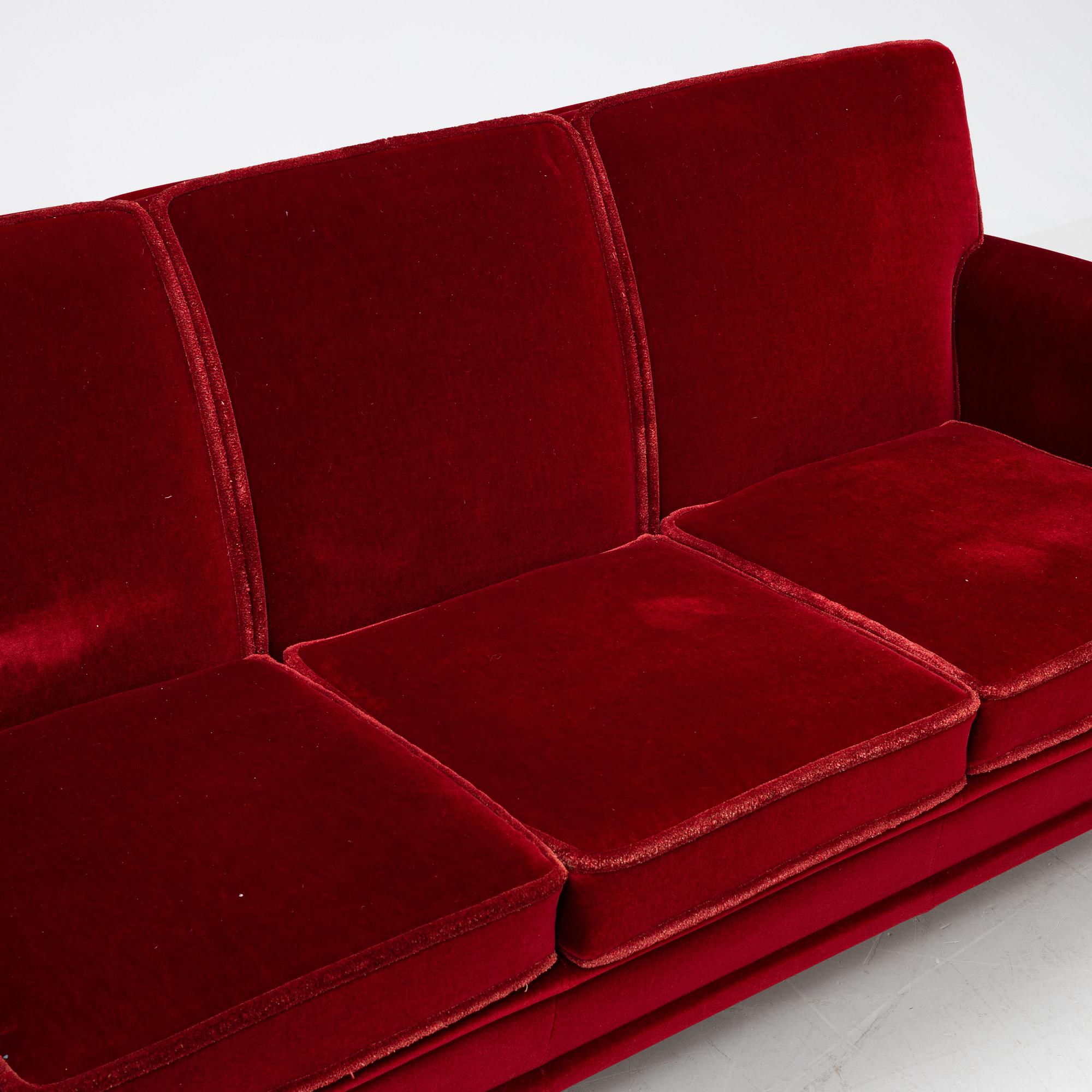 A velvet upholstered sofa, mid 20th Century.