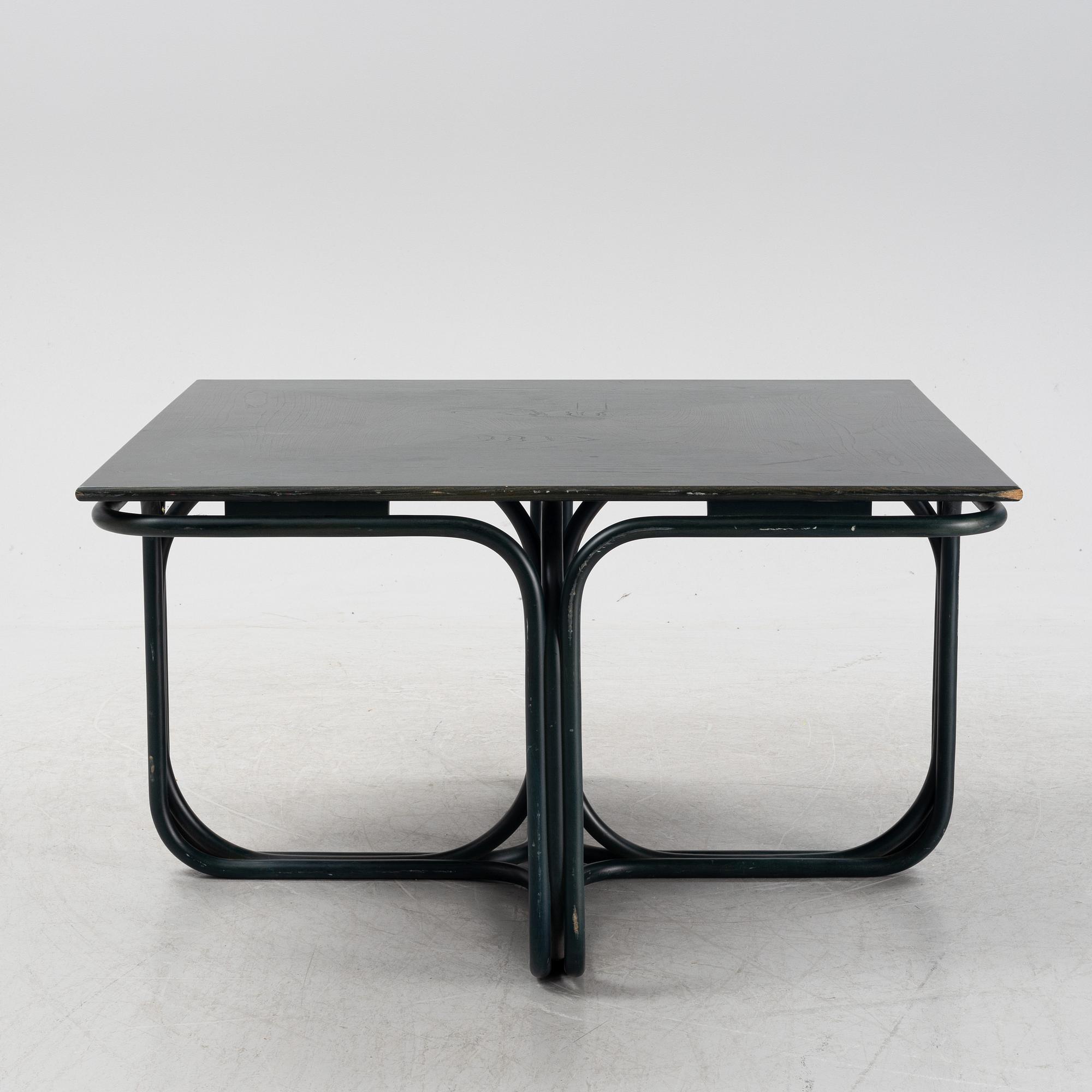 Jan Bocan, a stained beech dining table, late 20th Century.