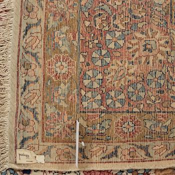 A semi-antique/old Kerman carpet, around 361 x 264 cm.