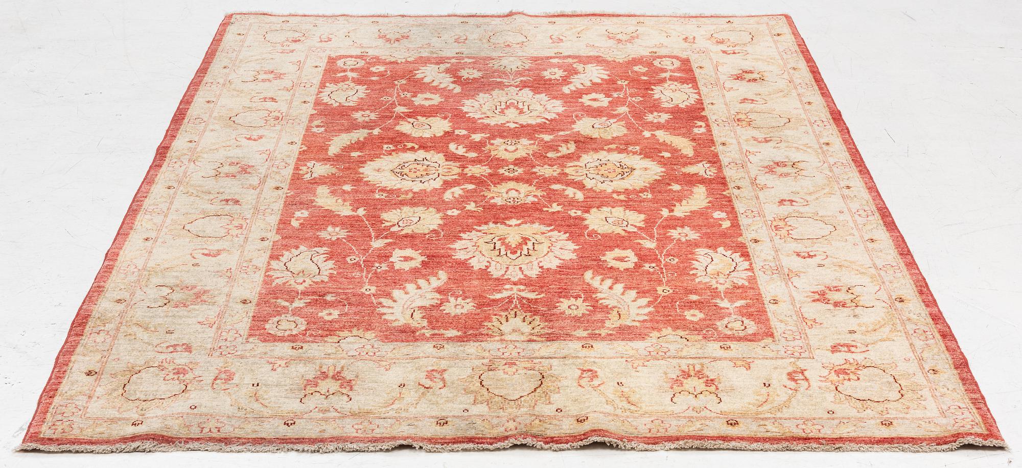 An Ushak carpet, c. 238 x 170 cm.