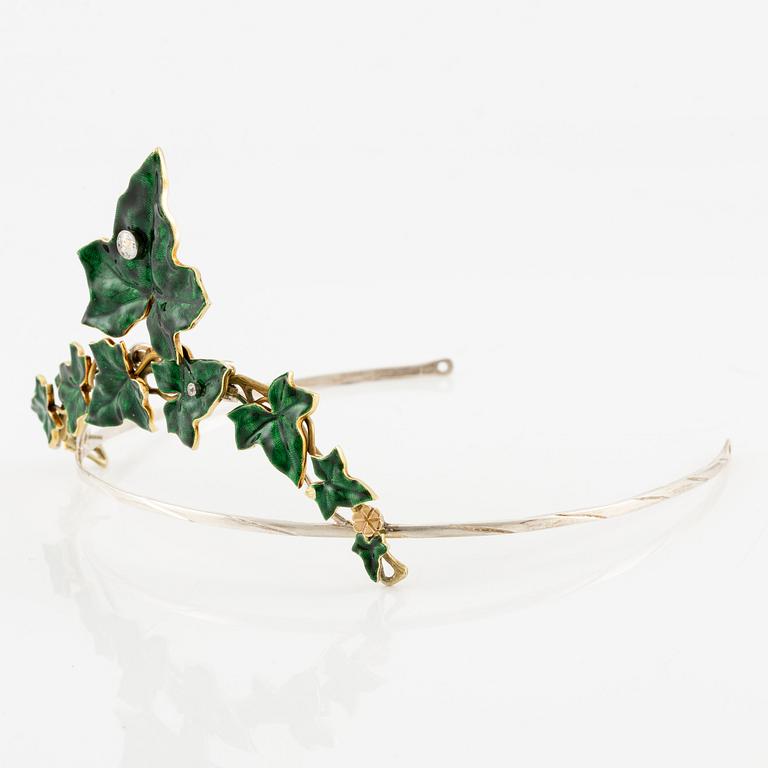 A necklace/tiara combination in 18K gold and green enamel set with old-cut diamonds.