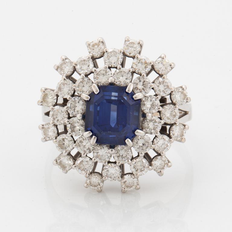 A sapphire and brilliant cut diamond ring.