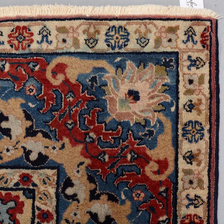 A CARPET, semi-antique, Tabriz, signed Jabarzade ca 337,5 x 242,5 cm.