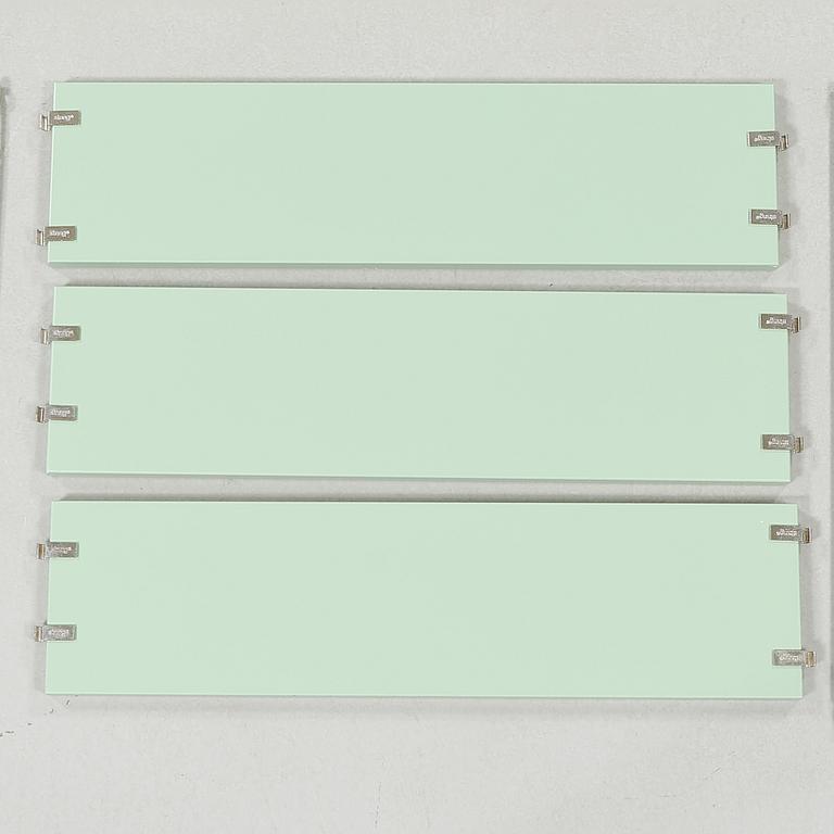 Four book shelves by Nils Strinning, 21th century.