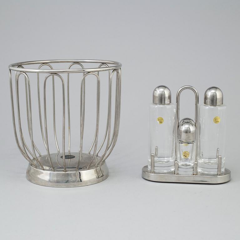2 pieces of Alessi stainless steel table ware.