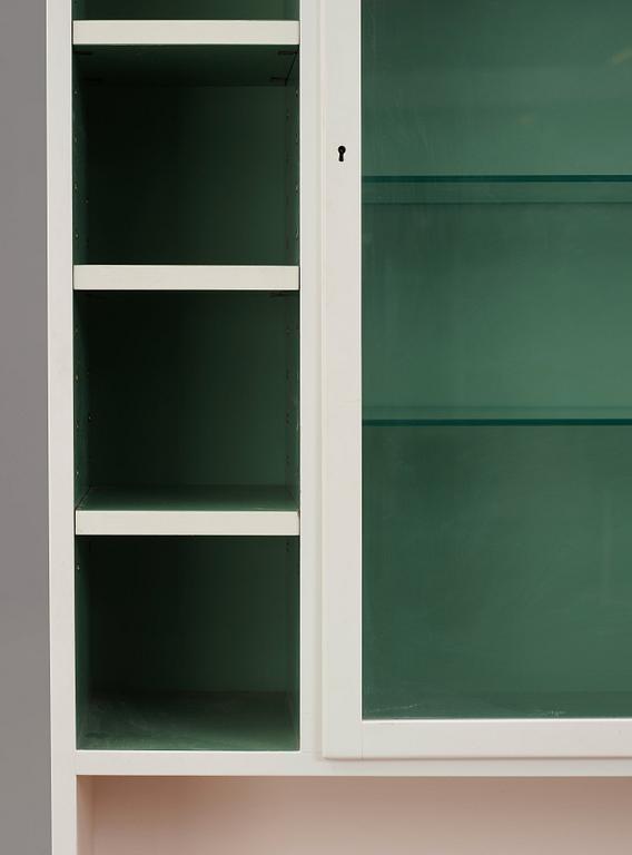 Josef Frank, a bookcase, a special edition of model nr 2255 with a showcase cabinet, Svenskt Tenn, Sweden 1960-1970s.