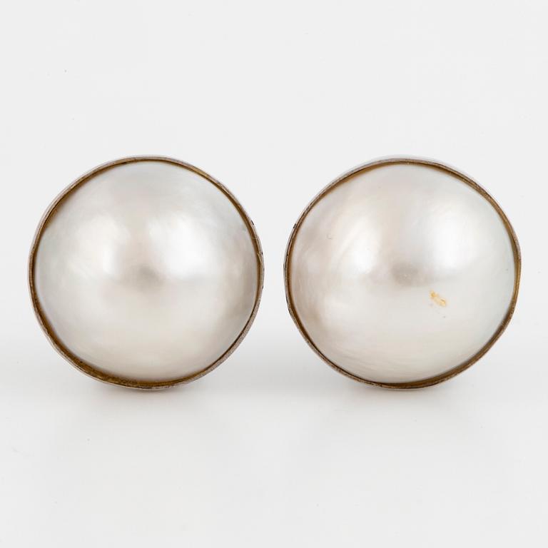 18K white gold mabe pearl earrings.