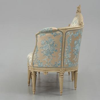 A grey-painted Gustavian 'canapé en corbeille'. sofa, by J E Höglander.