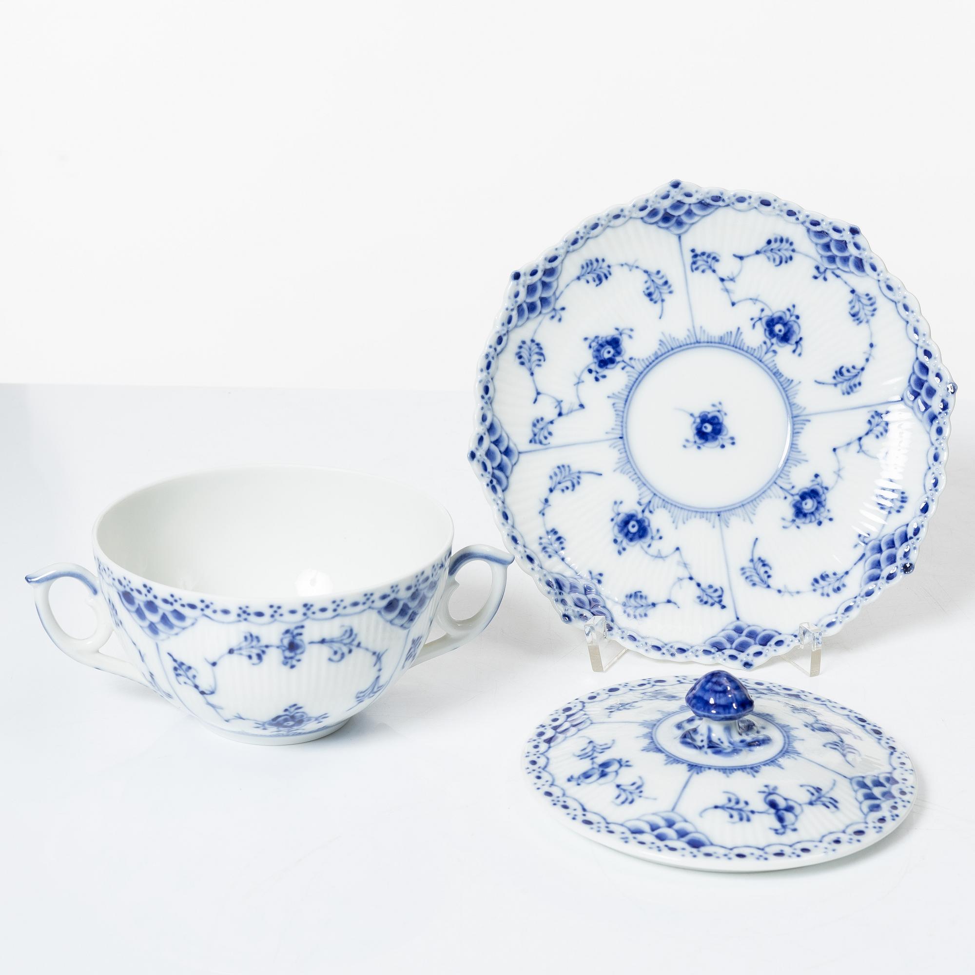 Royal Copenhagen, twelve consommé cups with saucers, 'Blue Fluted Half Lace', Denmark.