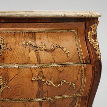 A rococo ormolu-mounted and parquetry commode attributed to C. G. Willkom (master in Stockholm 1763-65).