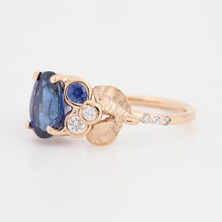 Sapphire and brilliant-cut diamond ring.