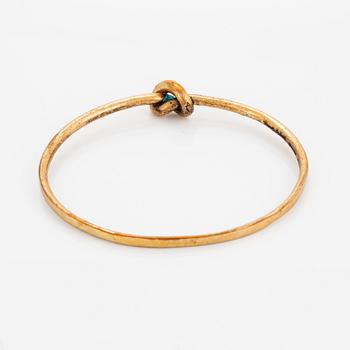 A Jorma Laine bracelet in bronze.