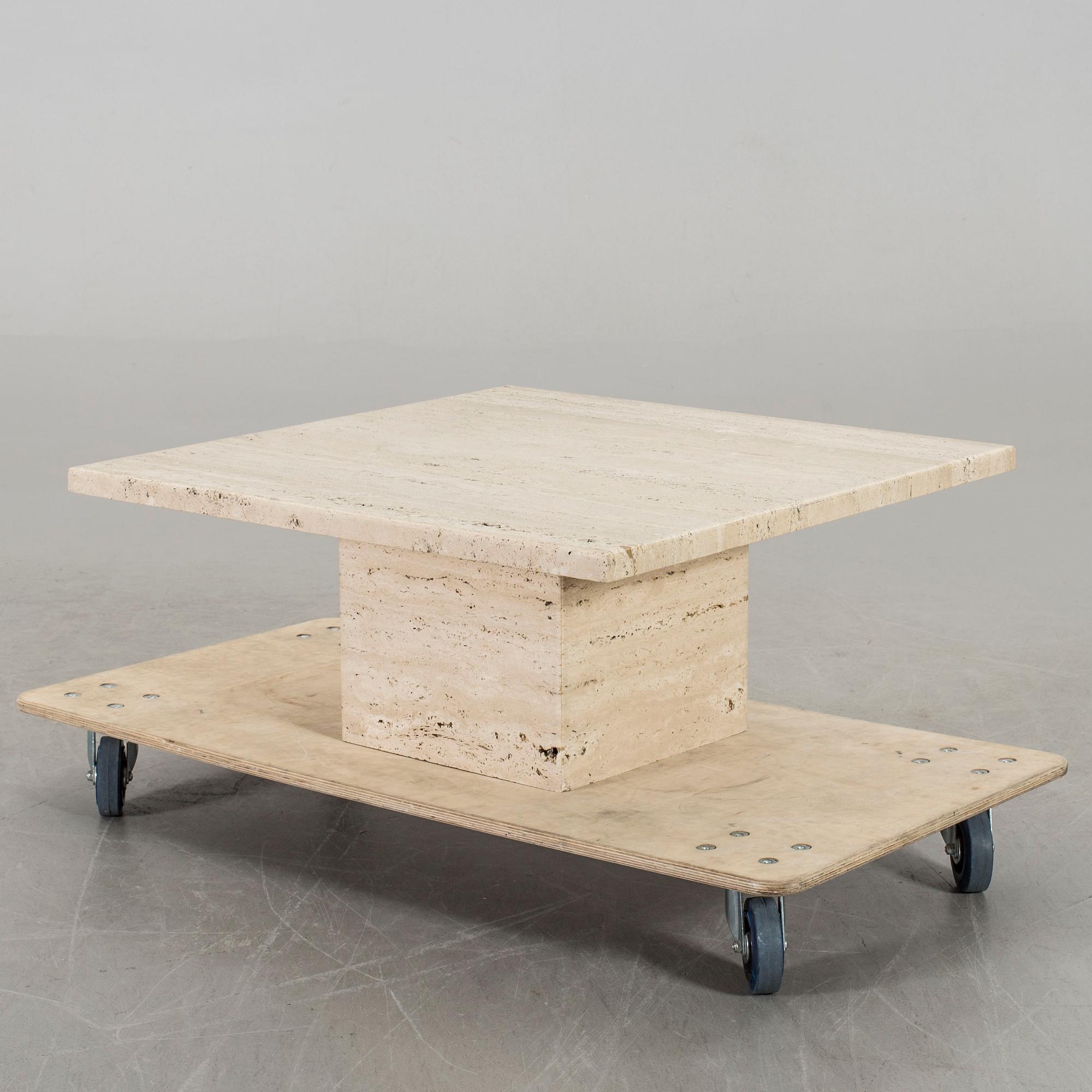 A TRAVERTINE SOFA TABLE, end of 20th century.