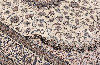 A Nain part silk carpet, 407 x 304 cm.