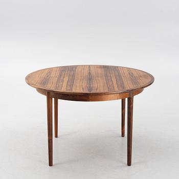 A Rosewood dining table and four chairs, Denmark. 1960-tal.