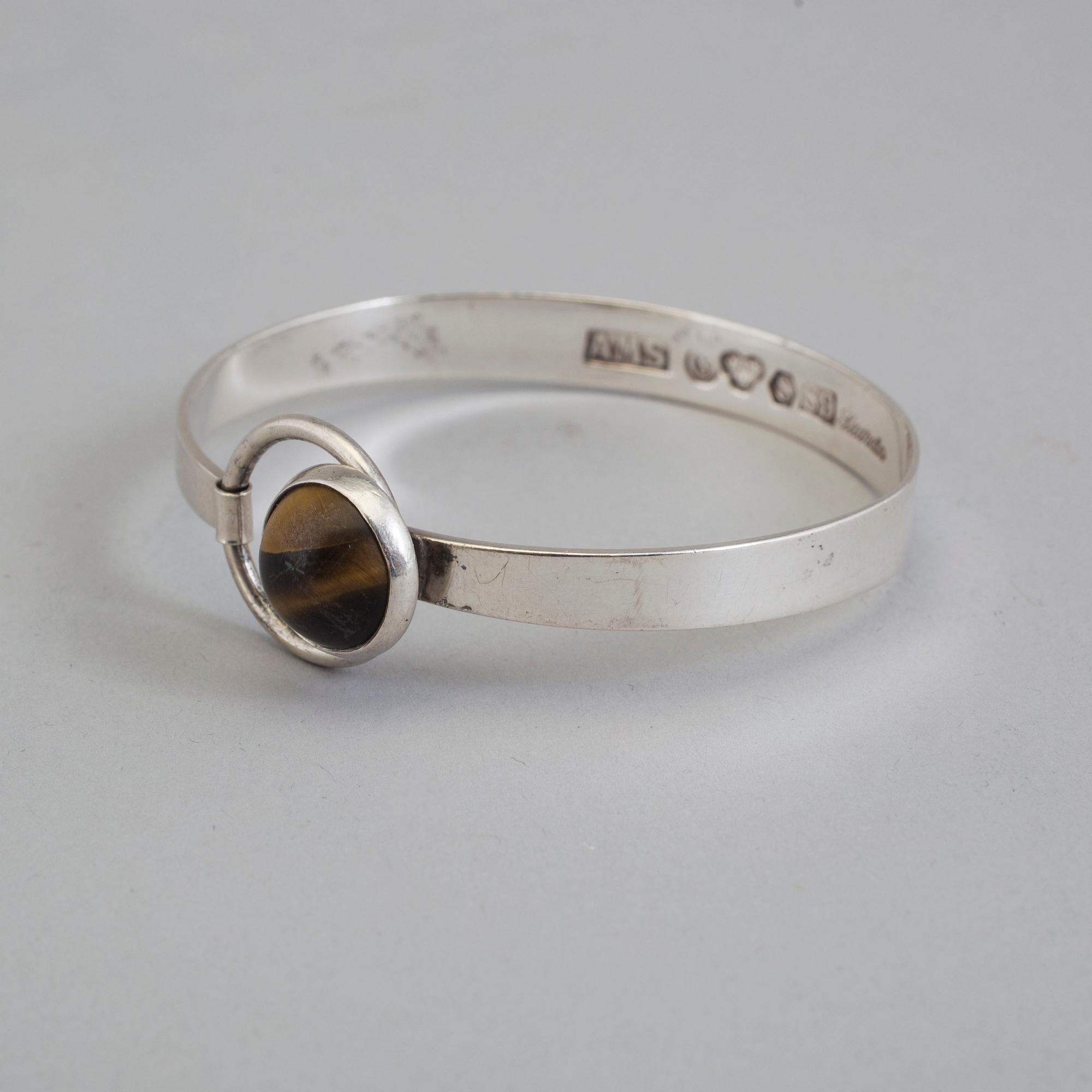 ARVO SAARELA, armring, silver och tigeröga, Enköping, 1968.