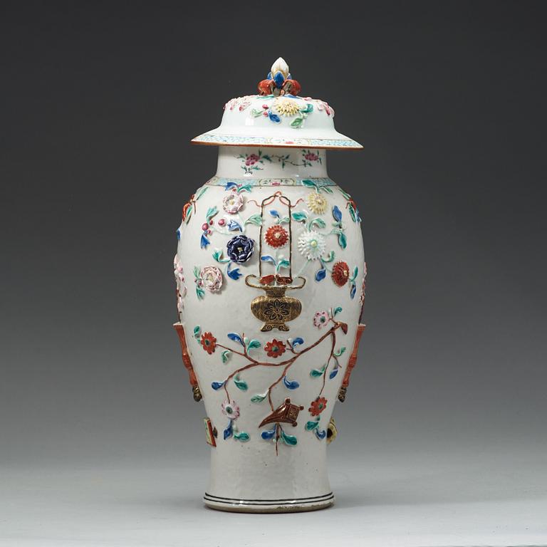 A famille rose porcelain vase and cover, Qingdynasty, circa 1800.