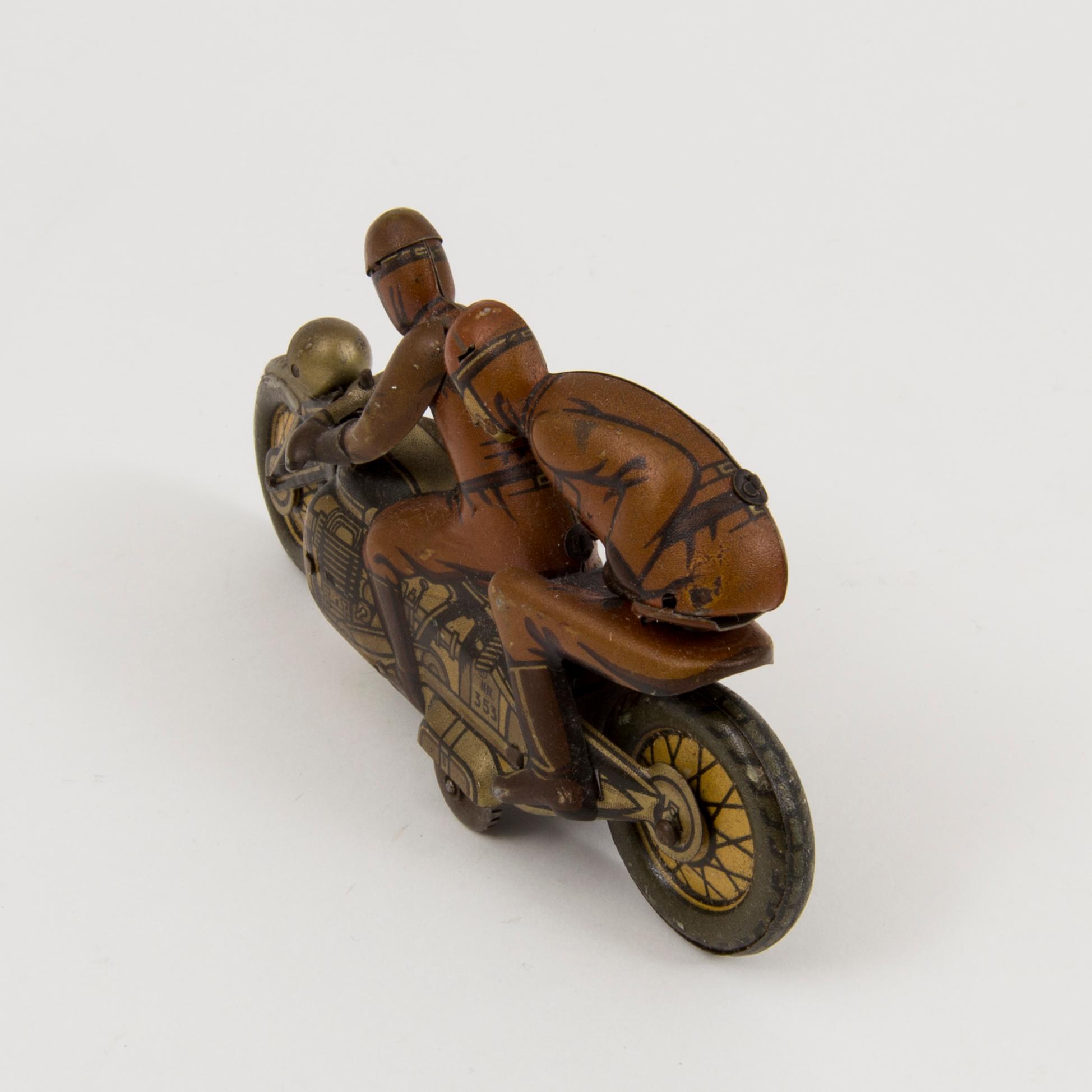 A tinplate Kellerman military motorcycle no 353, Germany, 1930s.