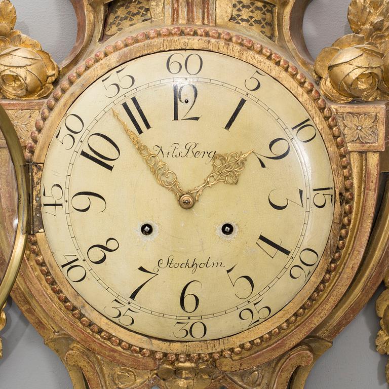 A  Gustavian wall clock signed Nils Berg Stockholm.