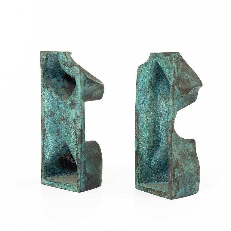 Björn Selder, a pair of green-patinated bronze sculptures/bookends, signed and numbered 4/100.