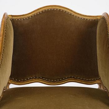 A French Louis Xv giltwood lit de repos, later part 18th century.