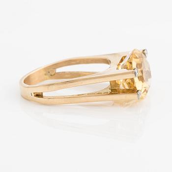 Ring in 18K gold with a faceted citrine and round brilliant-cut diamonds, Stockholm 1975.