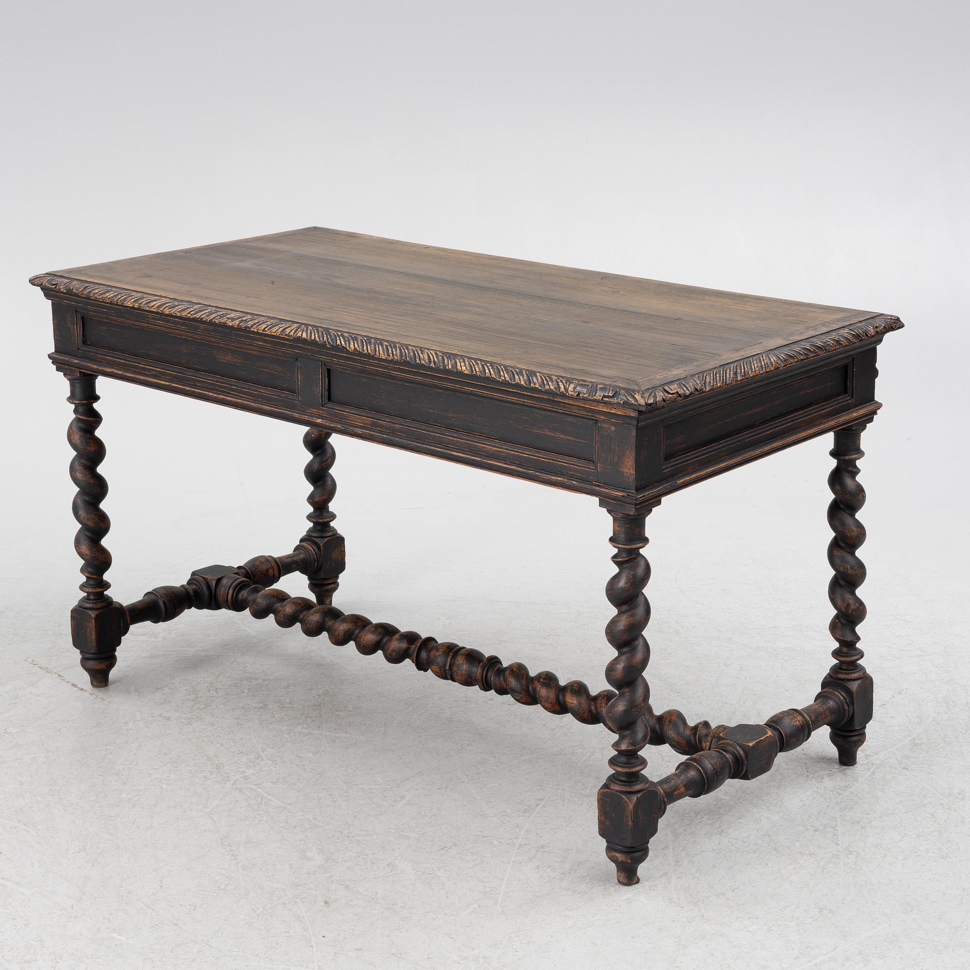 A Baroque style desk, circa 1900.