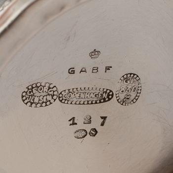 GEORG JENSEN,  a 830/1000 silver mug and  a bowl (a christening set), Copenhagen ca 1918-1927, design nr 127, 158.