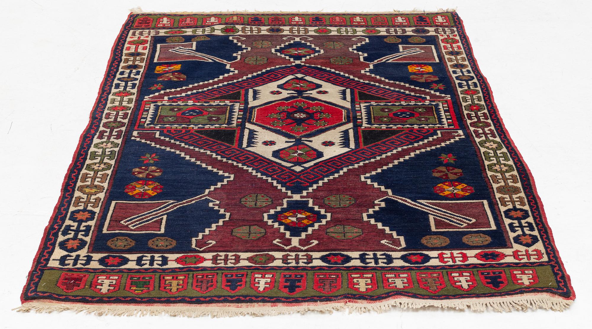 A likely old Anatol/Caucasus rug, c. 207 x 130 cm.