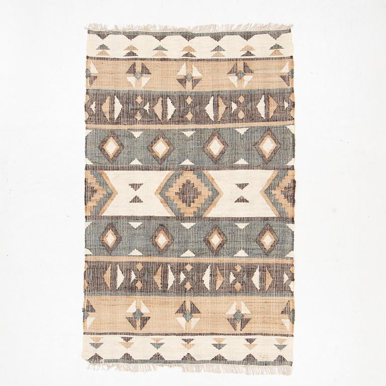 An Indian flat weave carpet,  approx. 287 x 174 cm.