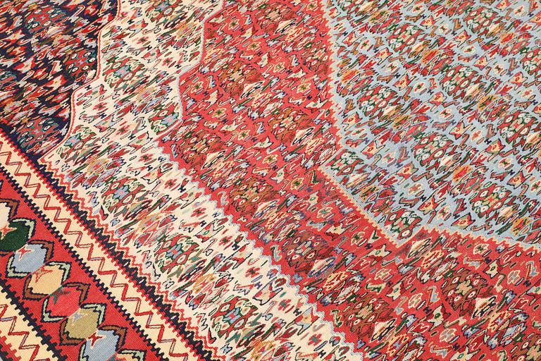 A Senneh kilim carpet,  c 271 x 200 cm.