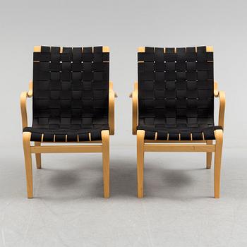 a pair of "Mina" armchairs by Bruno Matsson.