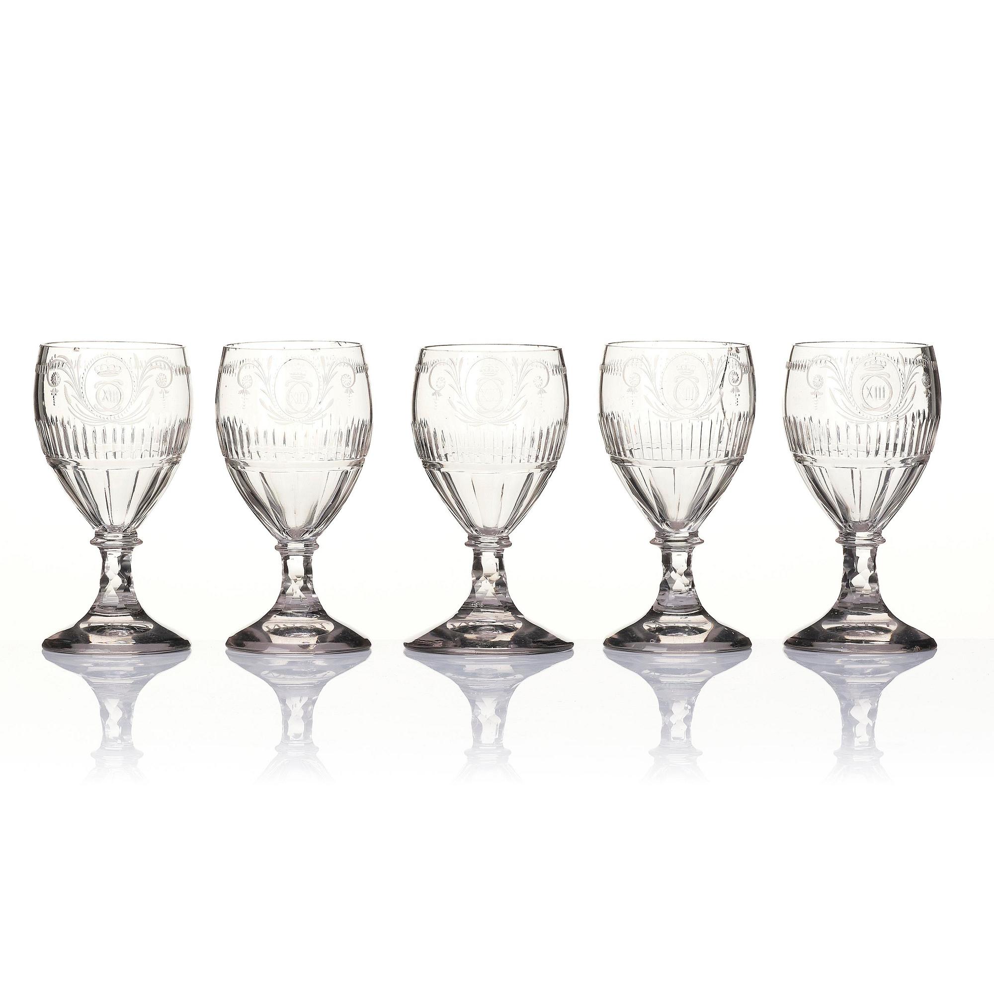 A 12 part glass service engraved by Anders Spolander, with the monogram of Carolus XIII, Reijmyre Sweden, 1810’s.