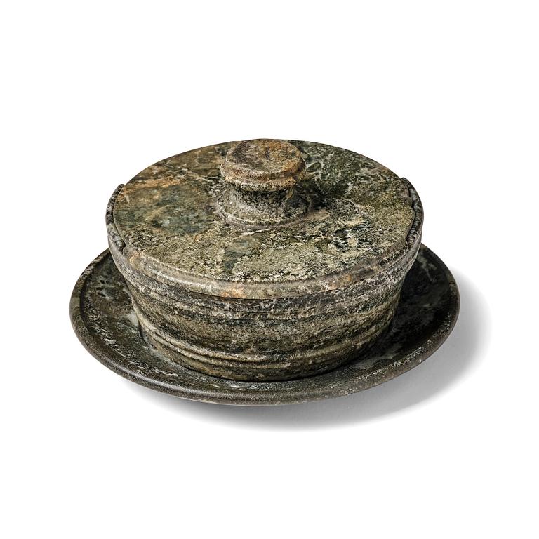 A Swedish Empire 'Kolmård' marble butter box with dish and cover, early 19th century.