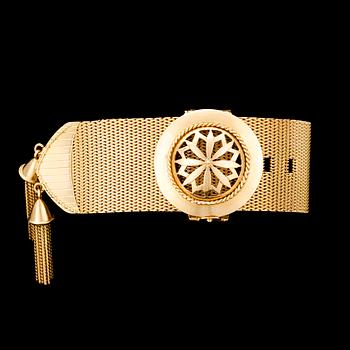 1040. A gold 'garter' bracelet, 1860's.