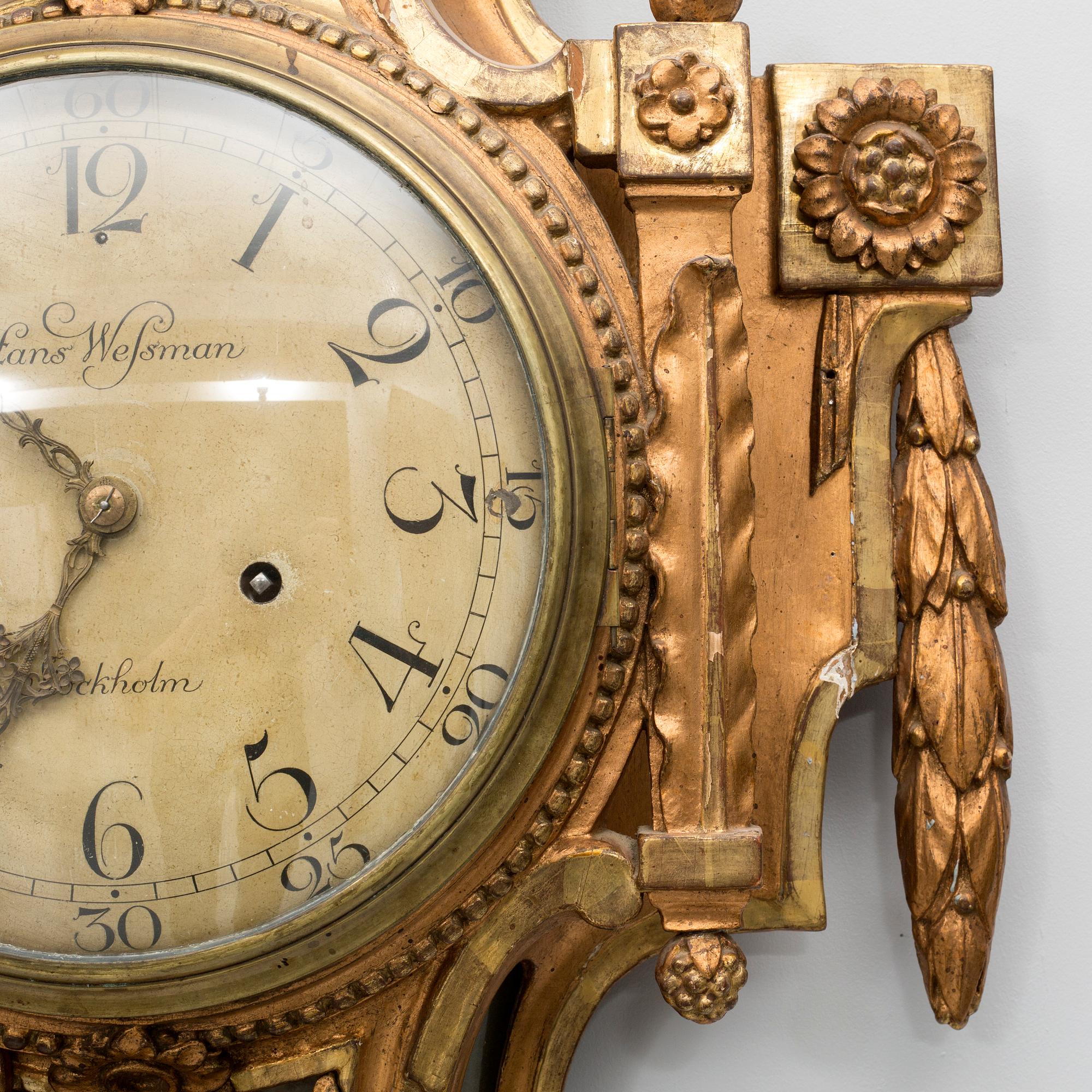 A gustavian wall clock, dial marked "Hans Wessman, Stockholm", around year 1800.