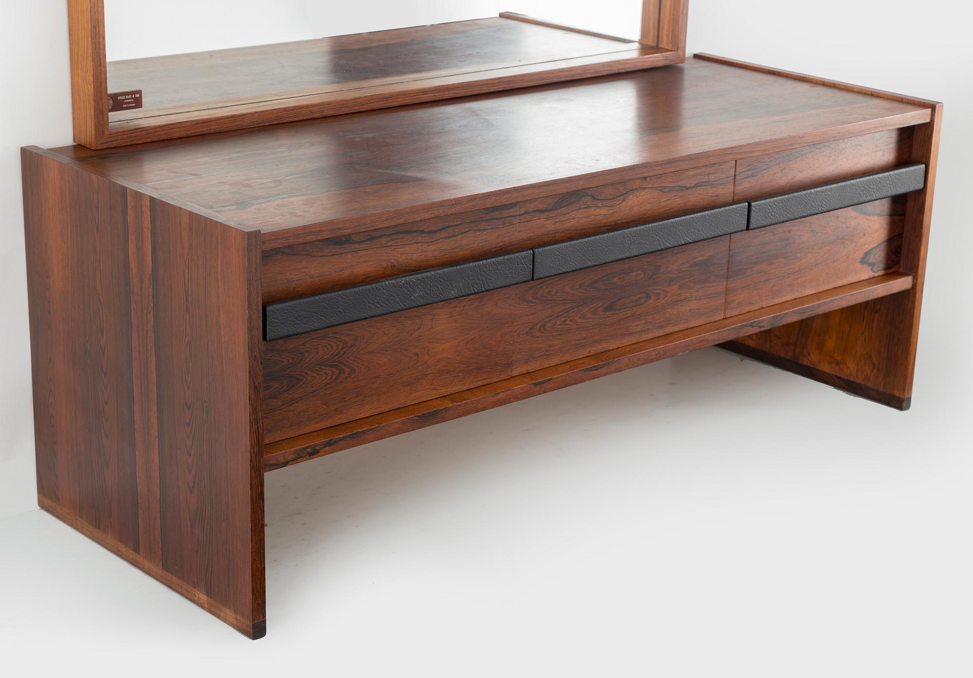 A mirror with a chest of drawer from Ateljé Glas & Trä, mid 20th century.