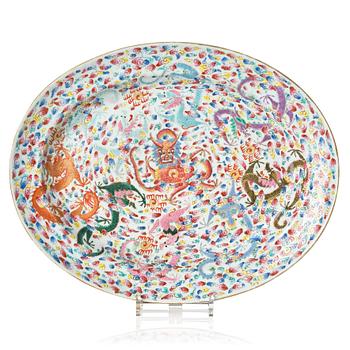 1273. A famille rose 'nine dragon' dish, Qing dynasty, 19th Century.